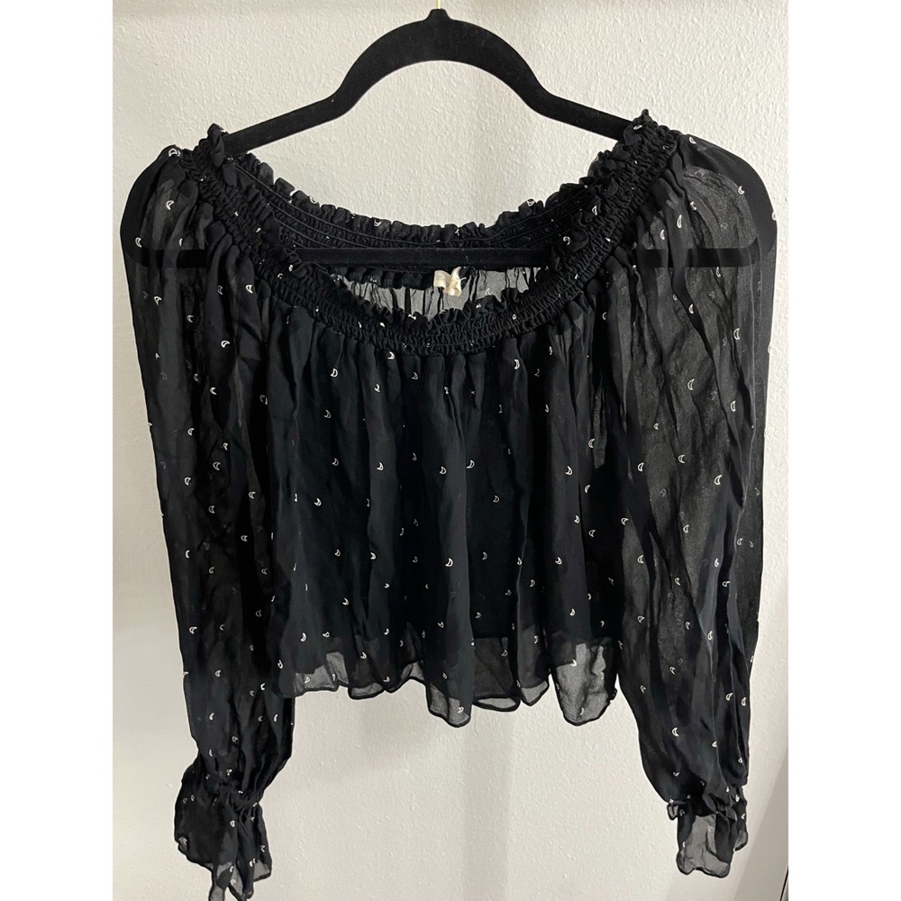 large, black mesh blouse